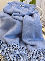 PONCHO CON FRANGE AZZURRO | 100% CASHMERE